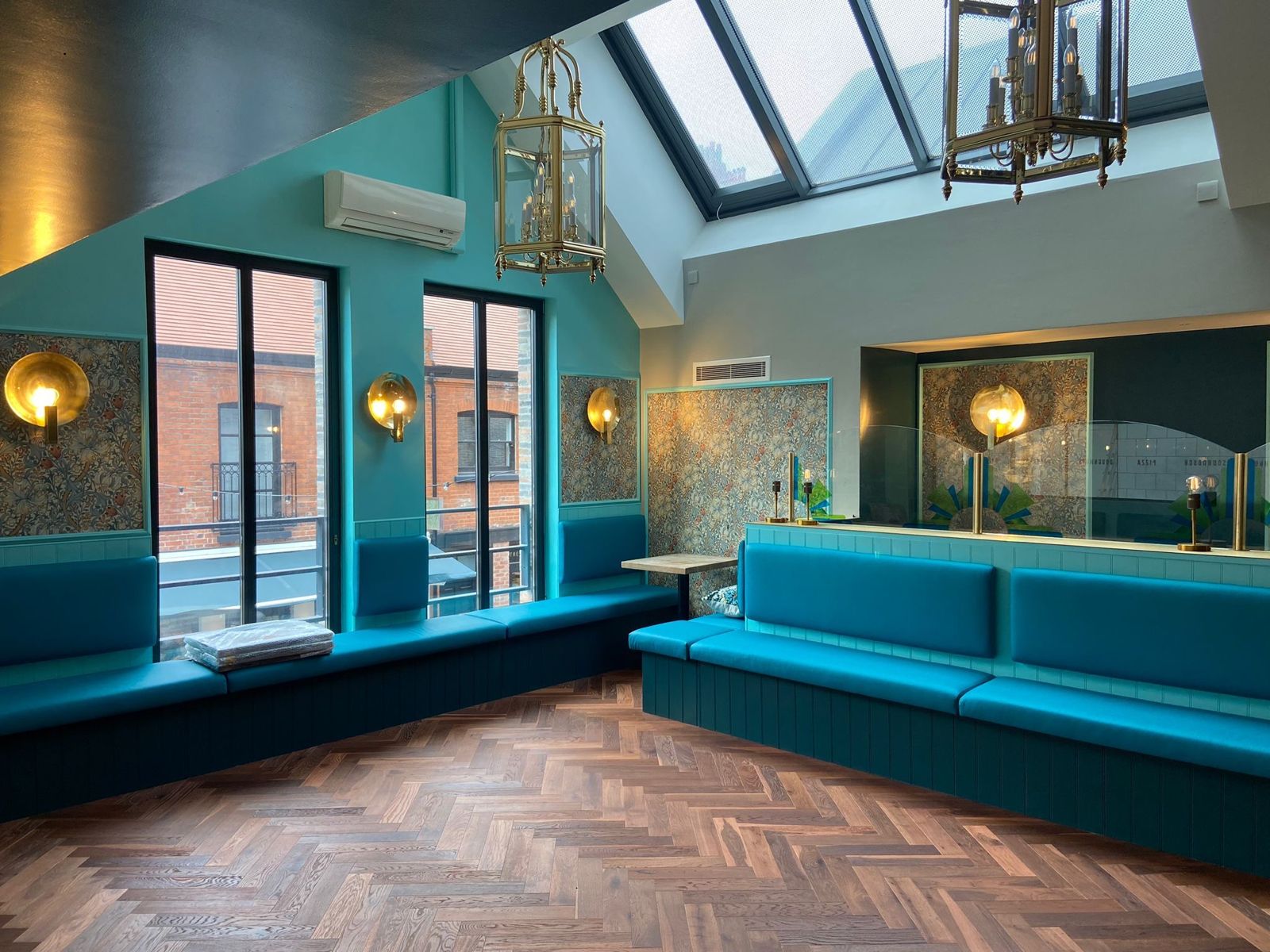 Restaurant interior painted in deep teal by IP Painter